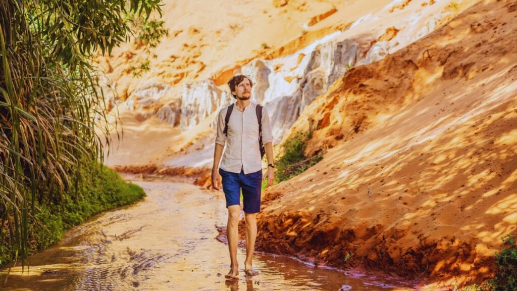 Mui Ne Travel Guide 2026: Vietnam’s Best Beach Escape for Sand Dunes, Seafood & Kitesurfing 7 Walking through Fairy Stream in Mui Ne, Phan Thiet