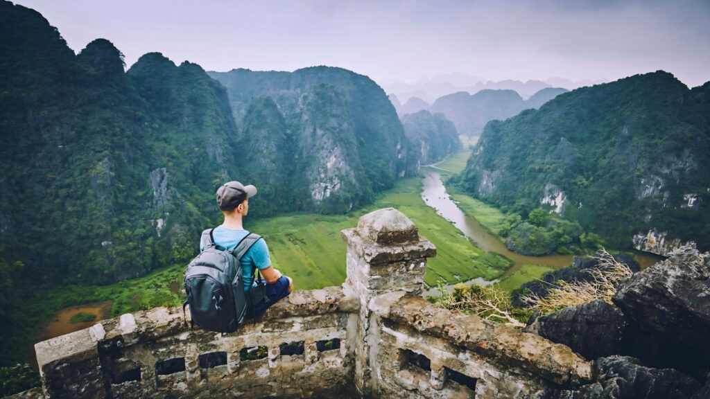 The Ultimate Vietnam Packing List for First-Time Travelers (2026 Guide) 9 Traveler exploring Vietnam with lightweight backpack