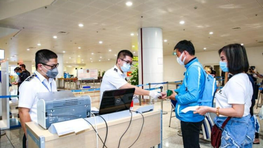 Hanoi Travel Guide 2026: Best Things to Do, Food, Attractions & Local Tips 🇻🇳 18 International travelers arriving at Vietnam airport immigration