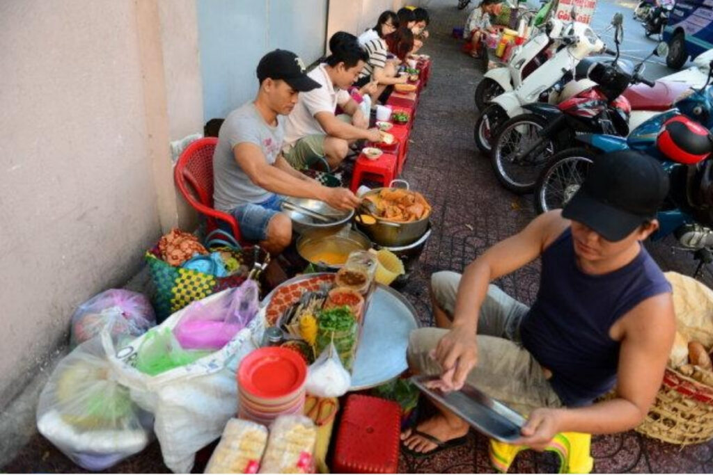 Ho Chi Minh City Food Guide: What to Eat in Vietnam's Food Capital 2 Morning street food vendors in Ho Chi Minh City