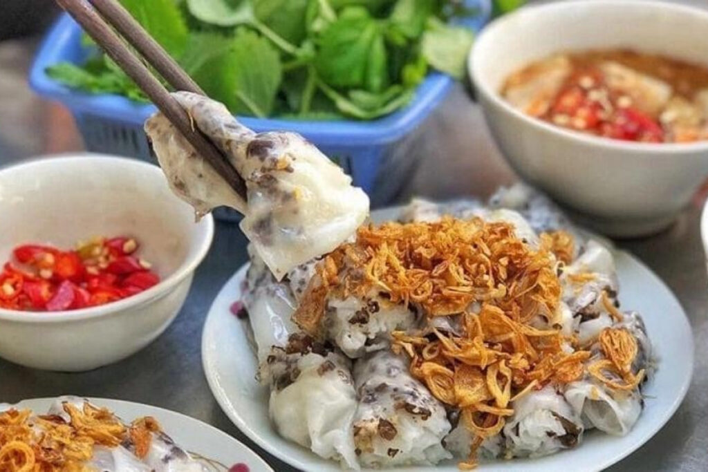 Hanoi Food Guide: 15 Must-Try Dishes & Where to Eat Like a Local 5 Freshly made Hanoi banh cuon steamed rice rolls filled with minced pork and mushrooms.