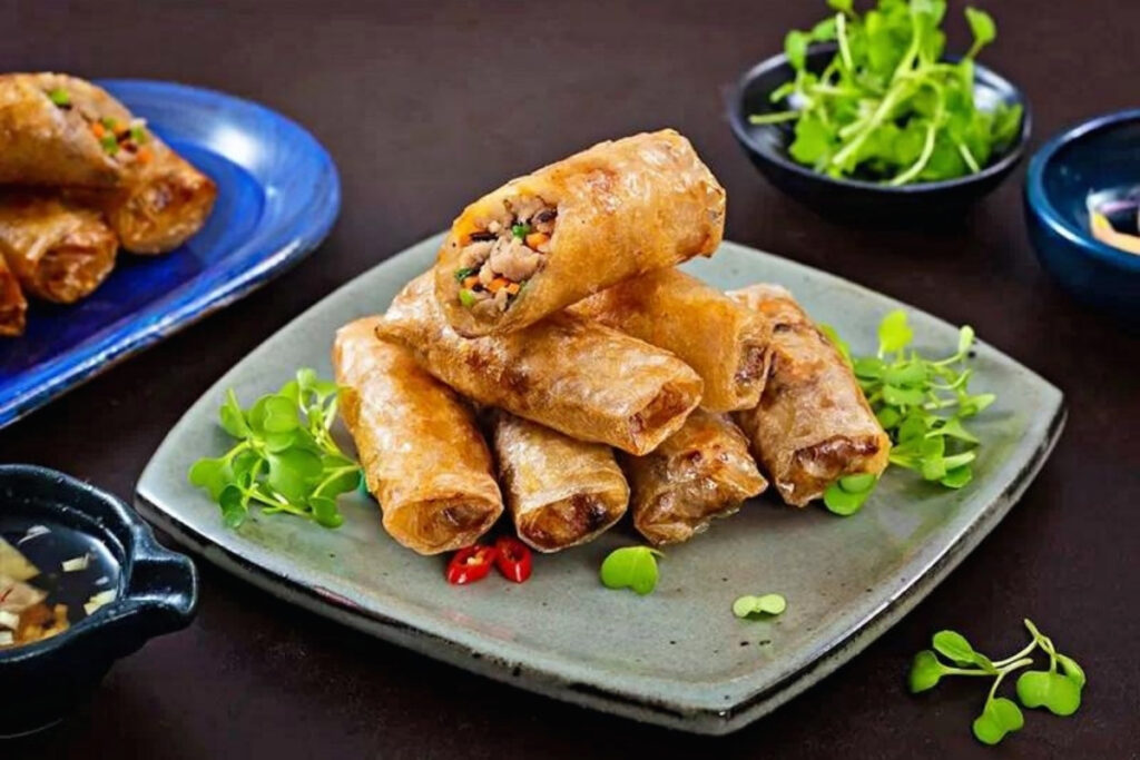Ho Chi Minh City Food Guide: What to Eat in Vietnam's Food Capital 14 Vietnamese fried spring rolls served with dipping sauce