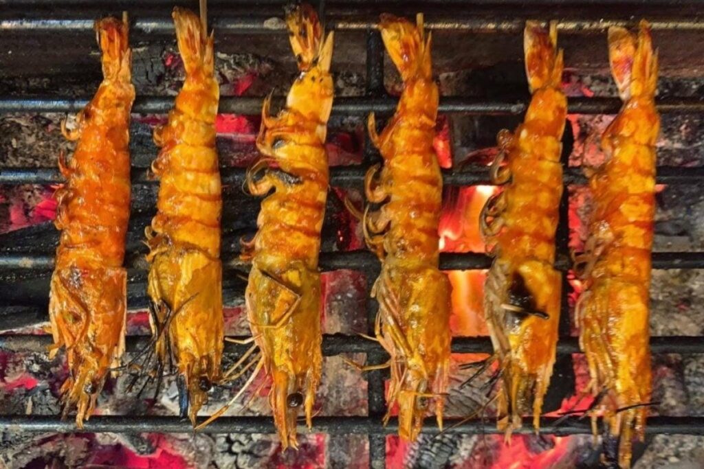 Ho Chi Minh City Food Guide: What to Eat in Vietnam's Food Capital 19 Charcoal grilled prawns served in Vietnam