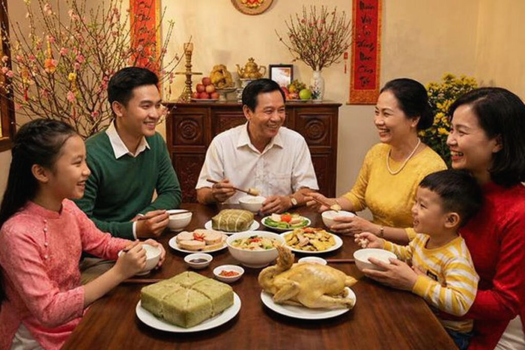 Tet Holiday in Vietnam: Traditions, Food, Customs, and How Vietnamese Celebrate Lunar New Year 8 Vietnamese family sharing a reunion dinner during Tet Holiday