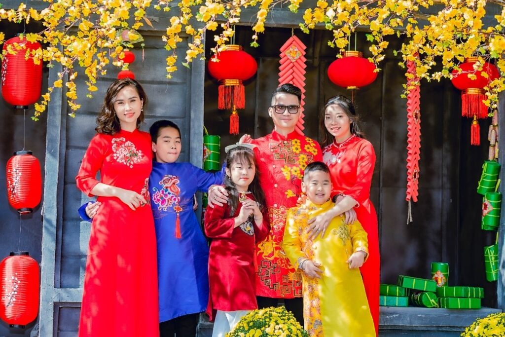 Vietnamese family wearing traditional Ao Dai during Tet holiday