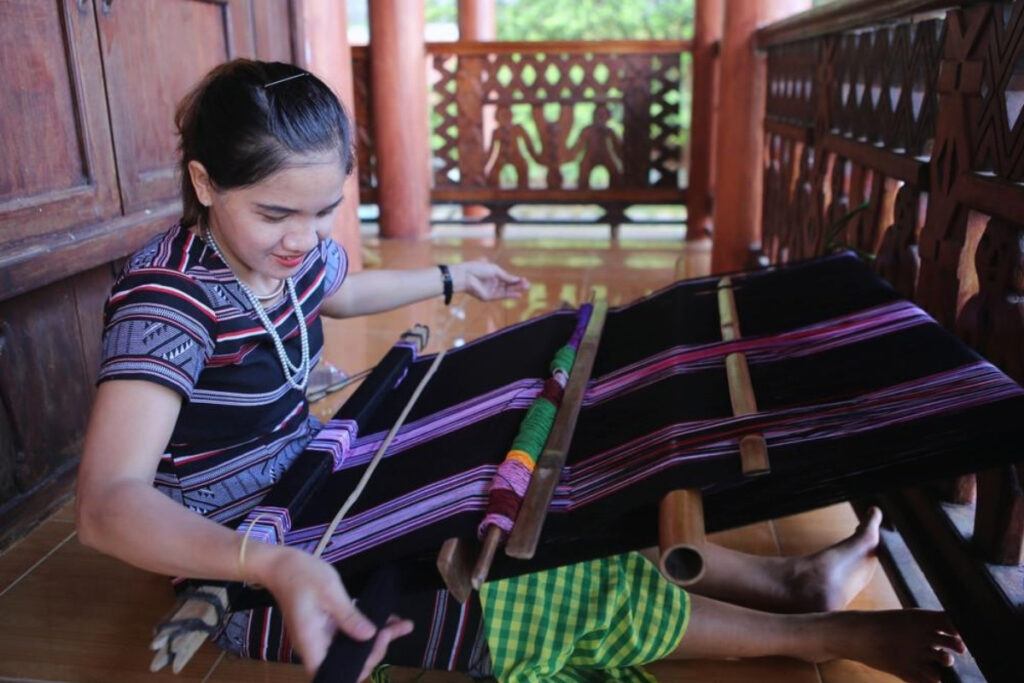 Traditional hand weaving by an ethnic artisan in Vietnam
