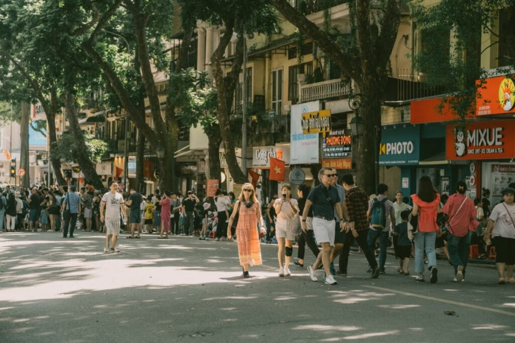 Foreign resident walking through a Vietnamese neighborhood