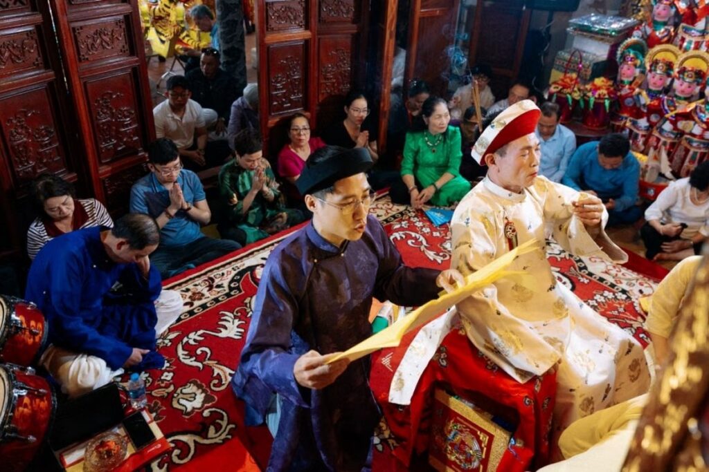 Vietnamese Religion & Beliefs: A Complete Guide to Faith, Spirituality, and Daily Life in Vietnam (2026) 7 Medium performing hầu đồng during a Mother Goddess ceremony