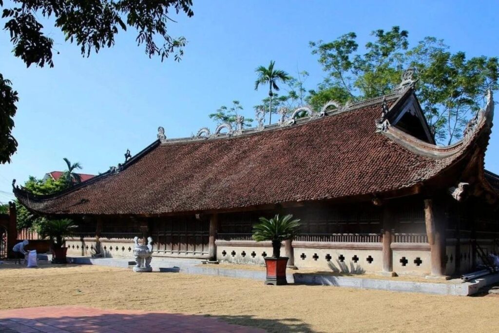 Vietnamese Religion & Beliefs: A Complete Guide to Faith, Spirituality, and Daily Life in Vietnam (2026) 6 Traditional Vietnamese communal house dedicated to the village guardian spirit