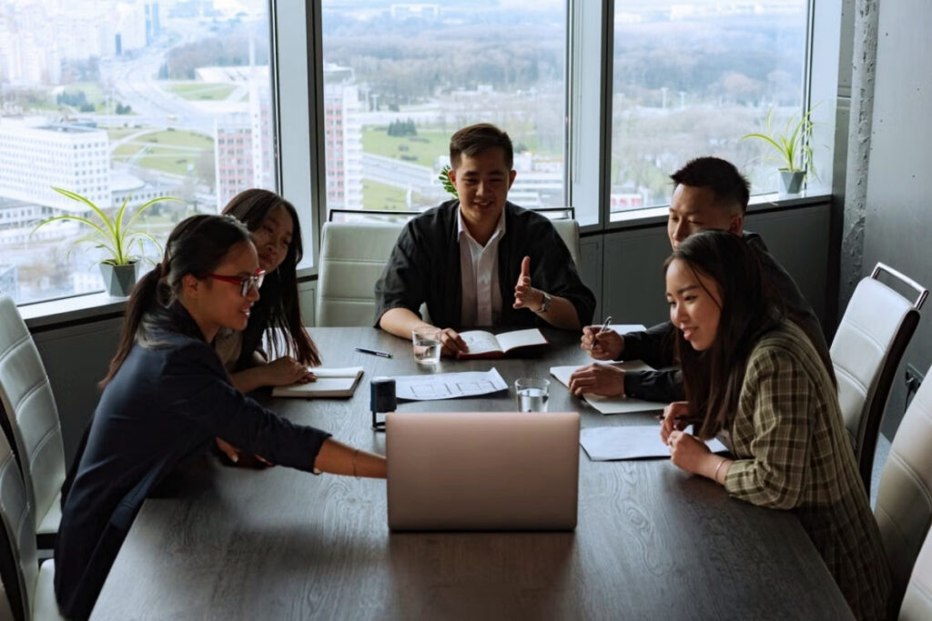 Vietnamese colleagues working together in an office