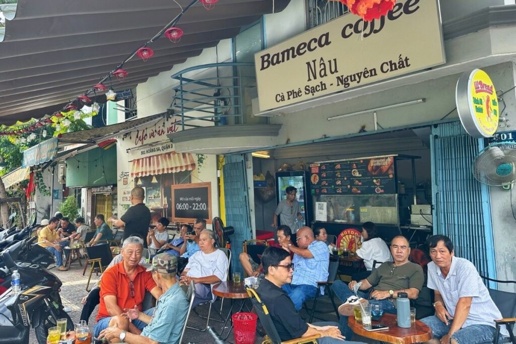 Vietnamese coffee culture at a sidewalk cafe in Ho Chi Minh City