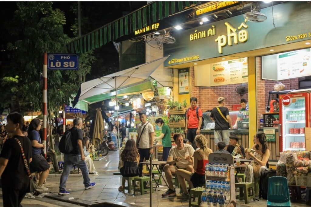 Foreign resident walking through an everyday Vietnamese neighborhood