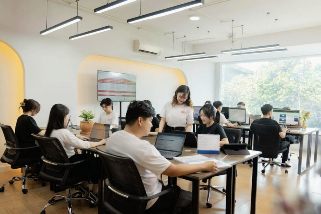 Young Vietnamese professionals working in a modern office