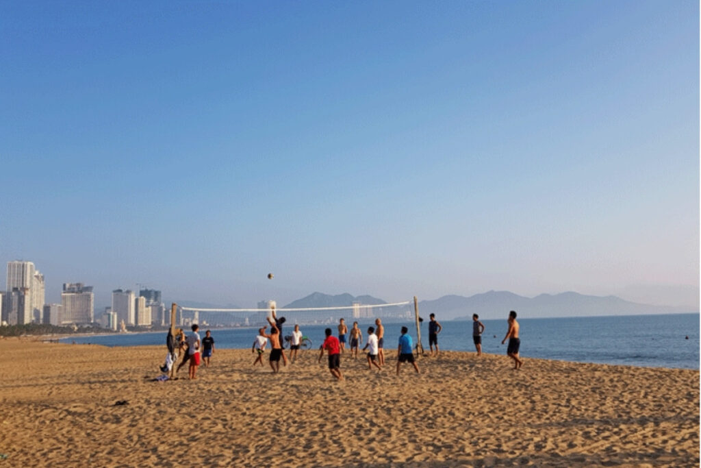 Local residents exercising on Nha Trang beach in the early morning