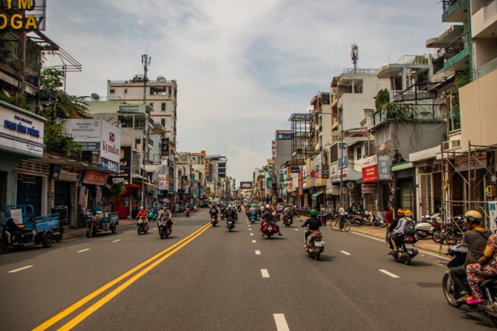 Motorbikes communicating through movement and position in Vietnam traffic