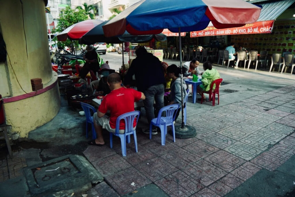 Small plastic stools at a Vietnamese sidewalk food stall