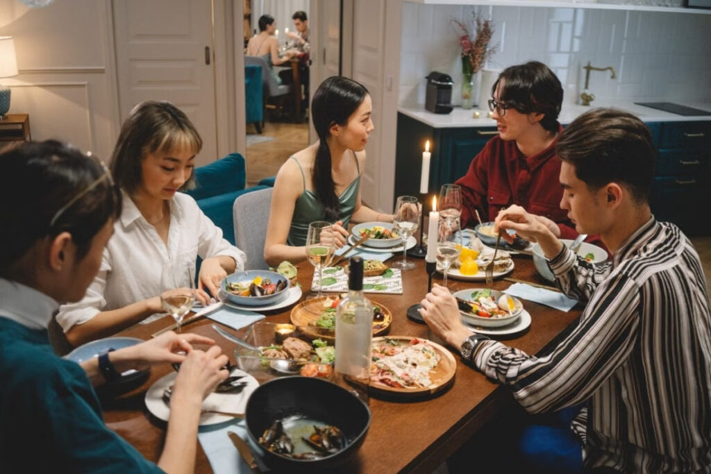 Foreign resident sharing a Vietnamese meal with local friends