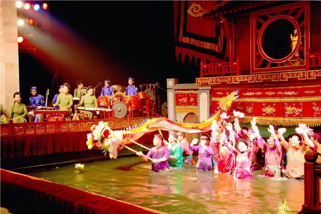 Vietnamese Water Puppet Show Guide: What to Expect & Where to Go 9 Dragon performing in a traditional Vietnamese water puppet show