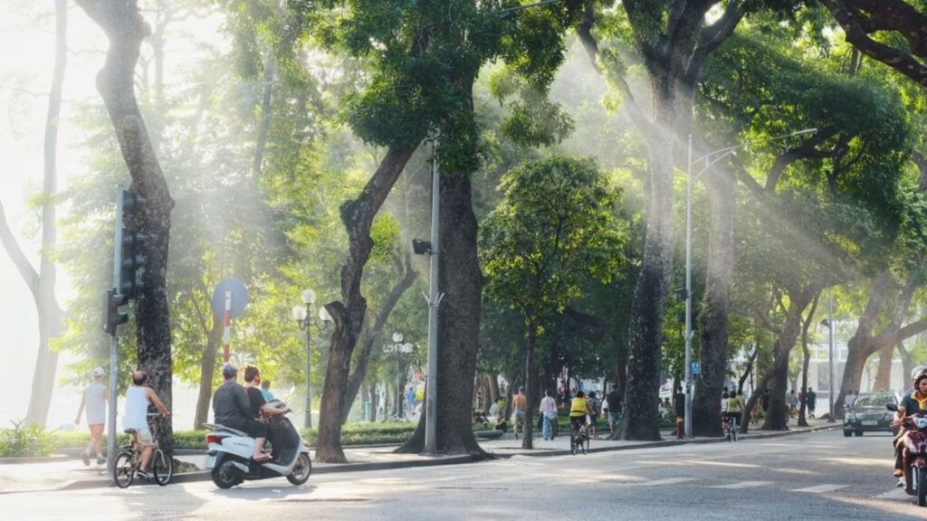 Why Do Vietnamese Wake Up So Early? Vietnamese people exercising around Hoan Kiem Lake